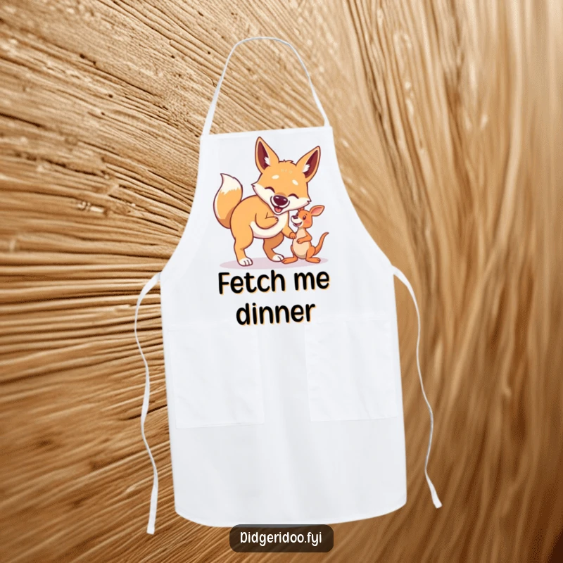 Funny Dingo Apron: A proud dingo gleefully plays fetch with a small kangaroo toy, ready for some kitchen chaos.
