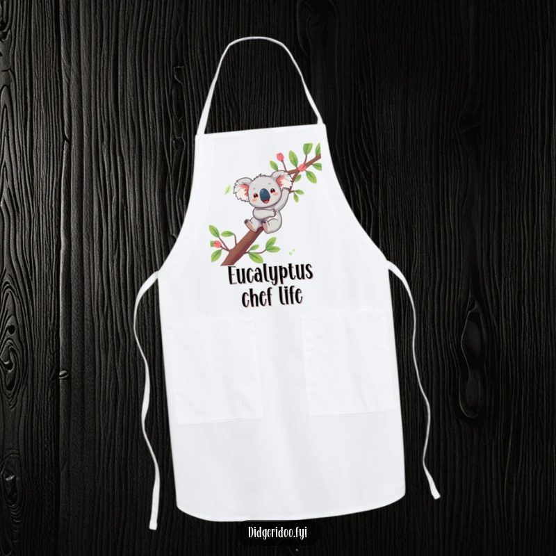 Funny koala apron showing a playful character joyfully dangling from a eucalyptus branch, adding relaxed Aussie charm to kitchen tasks.