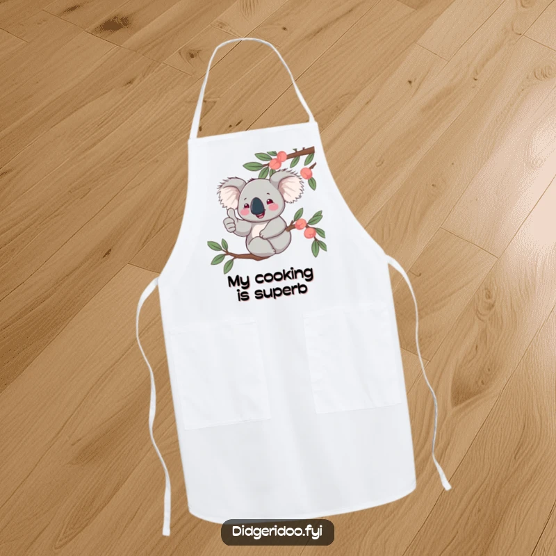 Funny, jovial koala character giving a thumbs up from a eucalyptus branch, featured on an apron to protect clothes while cooking with humor.