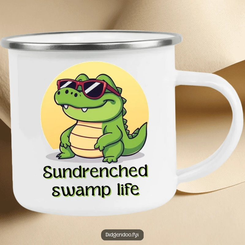 Funny crocodile camping mug showing a grinning reptile wearing sunglasses, basking in the sun, perfect for outdoor relaxation.