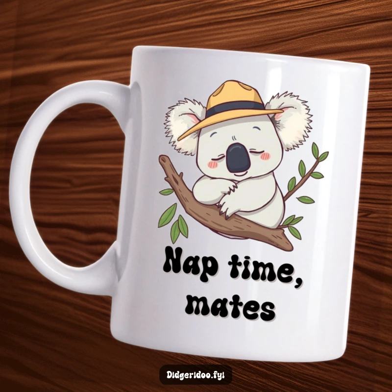 Funny Mug featuring a smiling koala wearing a tiny Akubra hat, peacefully snoozing on a branch.