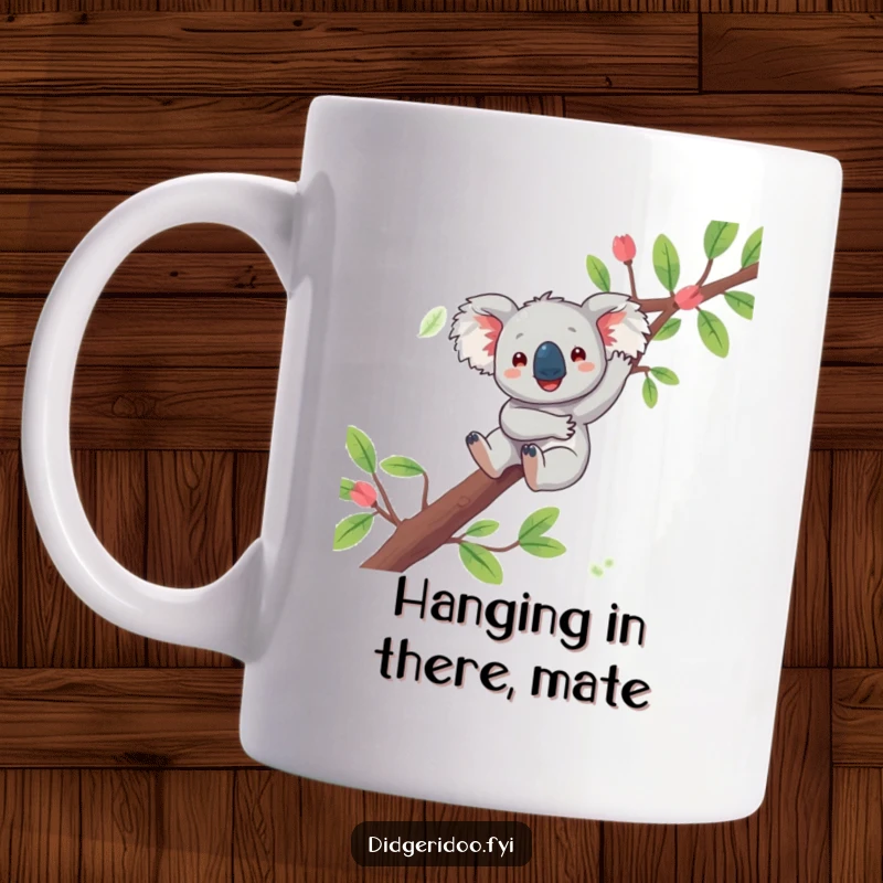 Funny koala mug featuring a playful character joyfully dangling from a eucalyptus branch, embodying cute and relaxed Aussie charm.