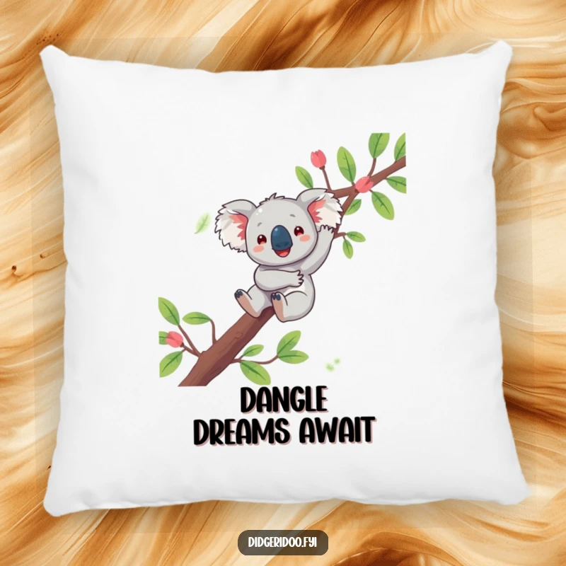 Funny koala pillow featuring a playful character joyfully dangling from a eucalyptus branch, bringing soft Aussie charm and humor.