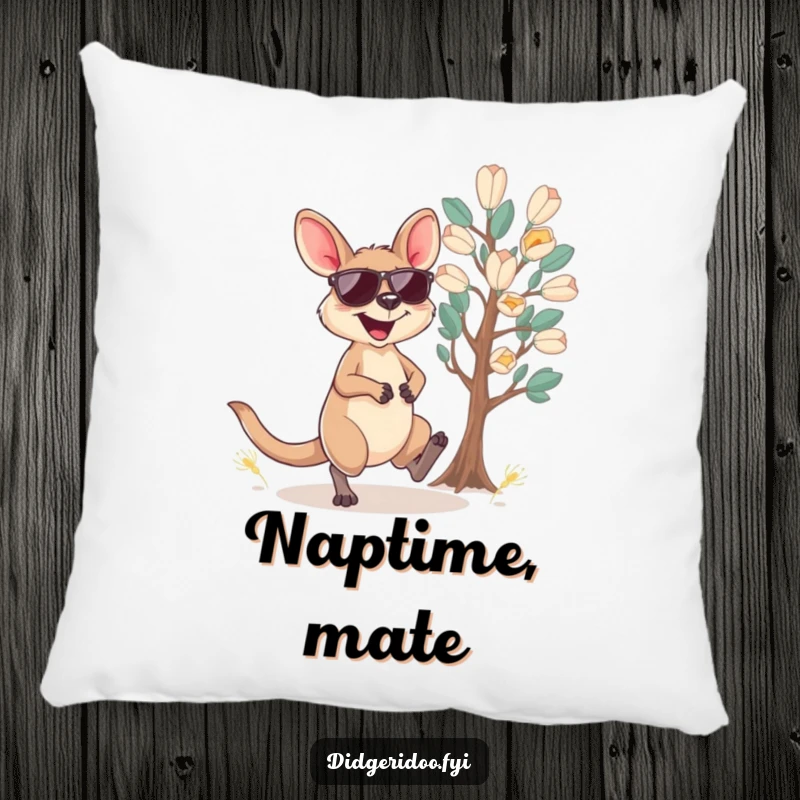 Funny wallaby pillow featuring a cool wallaby in sunglasses hopping near eucalyptus, a soft and humorous accent.