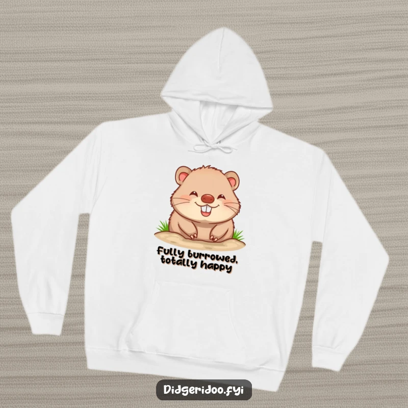 Funny wombat hoodie depicting a cheerful, happy wombat in the act of burrowing, showcasing a big, content grin for ultimate comfort.