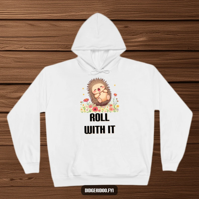 Funny Echidna Wildflower Hoodie: A playful echidna rolls with joy through a field of blooming wildflowers, offering cozy fun.