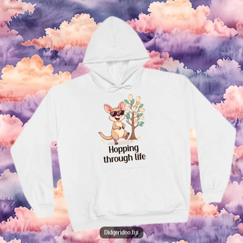 Funny wallaby hoodie showing a joyful wallaby in sunglasses hopping near a eucalyptus tree, ideal for cozy humor.