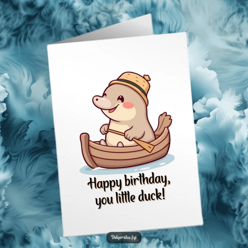 Funny Free Printable Birthday Card: Giggling platypus in a cork hat paddles a mini boat.