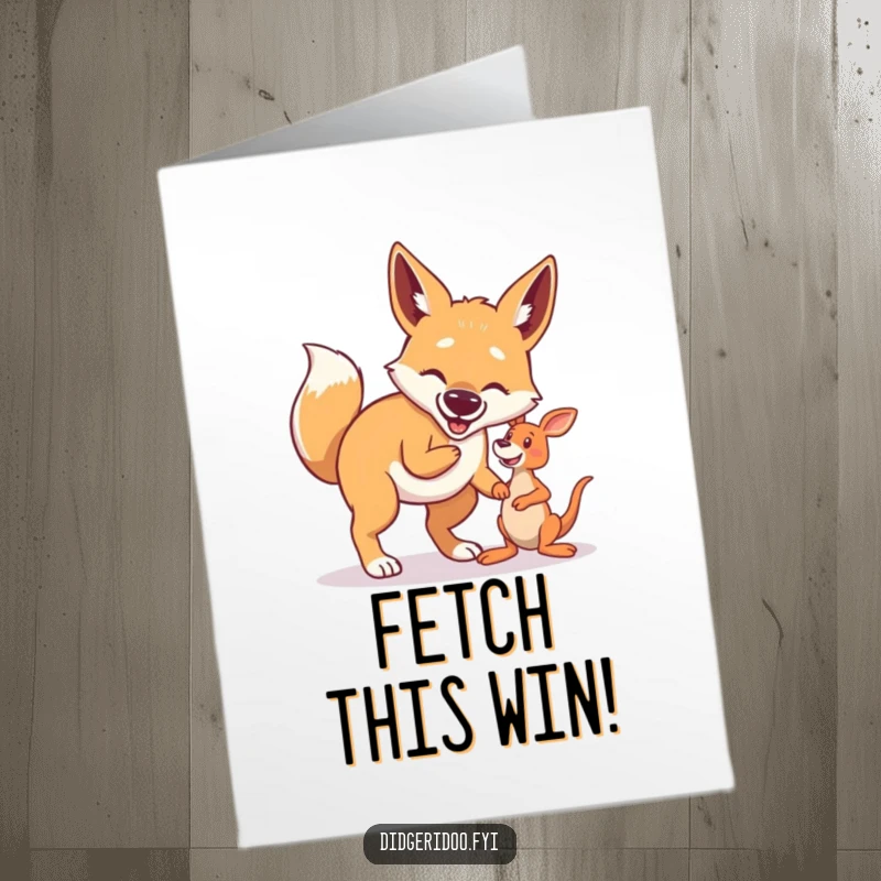 Funny Free Printable Congrats Card: Proud dingo energetically playing fetch with a kangaroo toy, celebrating an achievement.