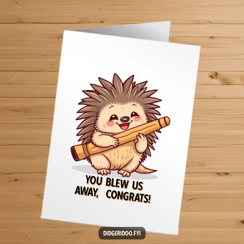 Funny free printable congratulations card of a happy echidna playing a didgeridoo in celebration.
