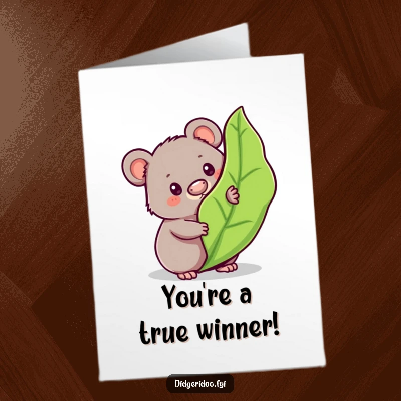 Funny Free Printable Congratulations Card: a curious wombat peeking behind a gum leaf, celebrating your achievement.