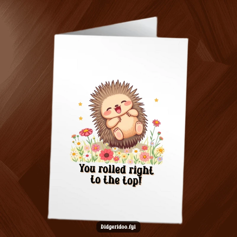 Adorable free printable congratulations card showing a playful echidna joyfully rolling amidst a field of colorful wildflowers.