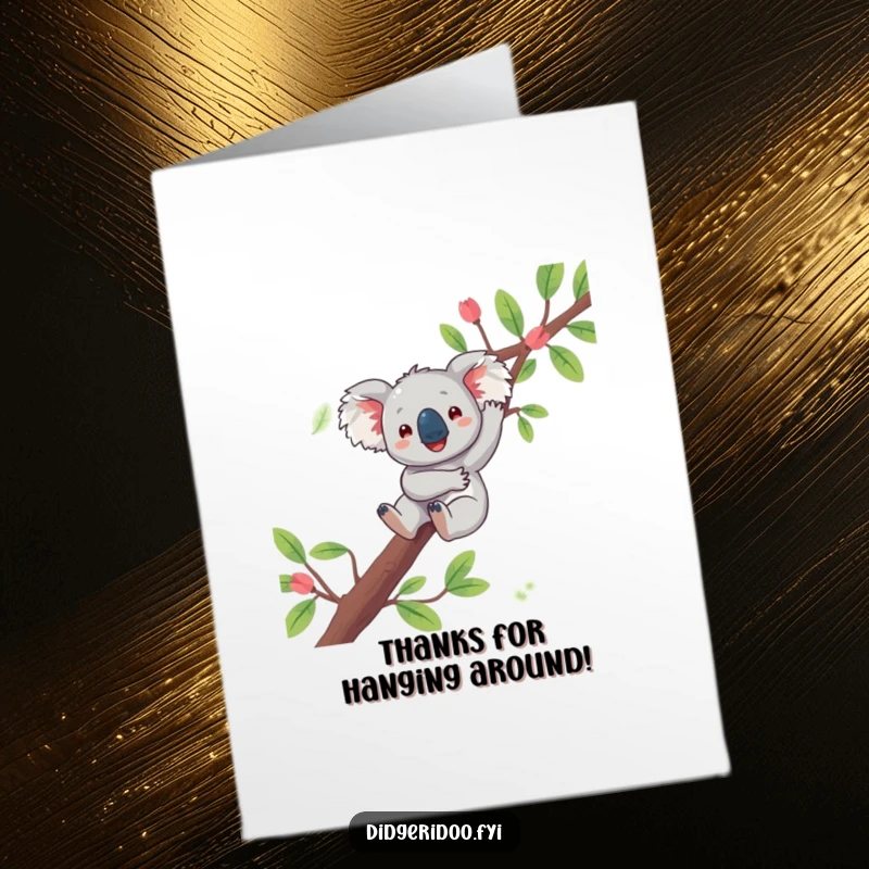 Funny Free Printable Thank You Card: a playful koala joyfully dangling from a eucalyptus branch, sending thanks.