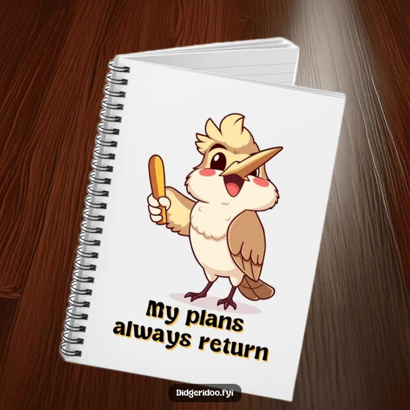 Funny, delighted kookaburra character joyfully throwing a boomerang, featured on the cover of a notebook for writing and sketching.