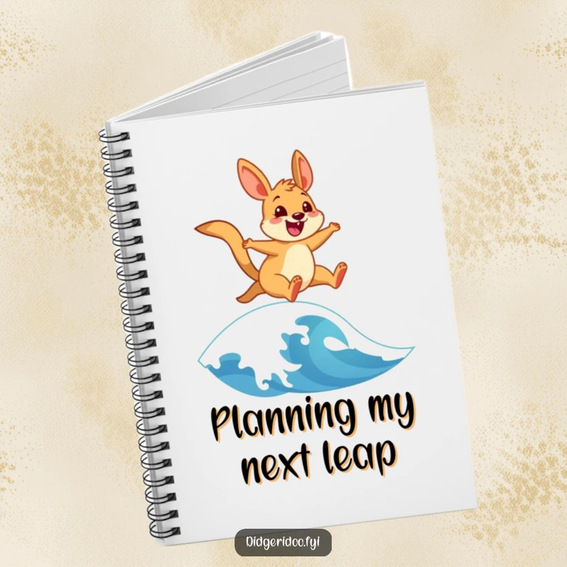 Funny notebook adorned with a cheerful wallaby leaping energetically over a stylized wave, inspiring fun thoughts and creative ideas.